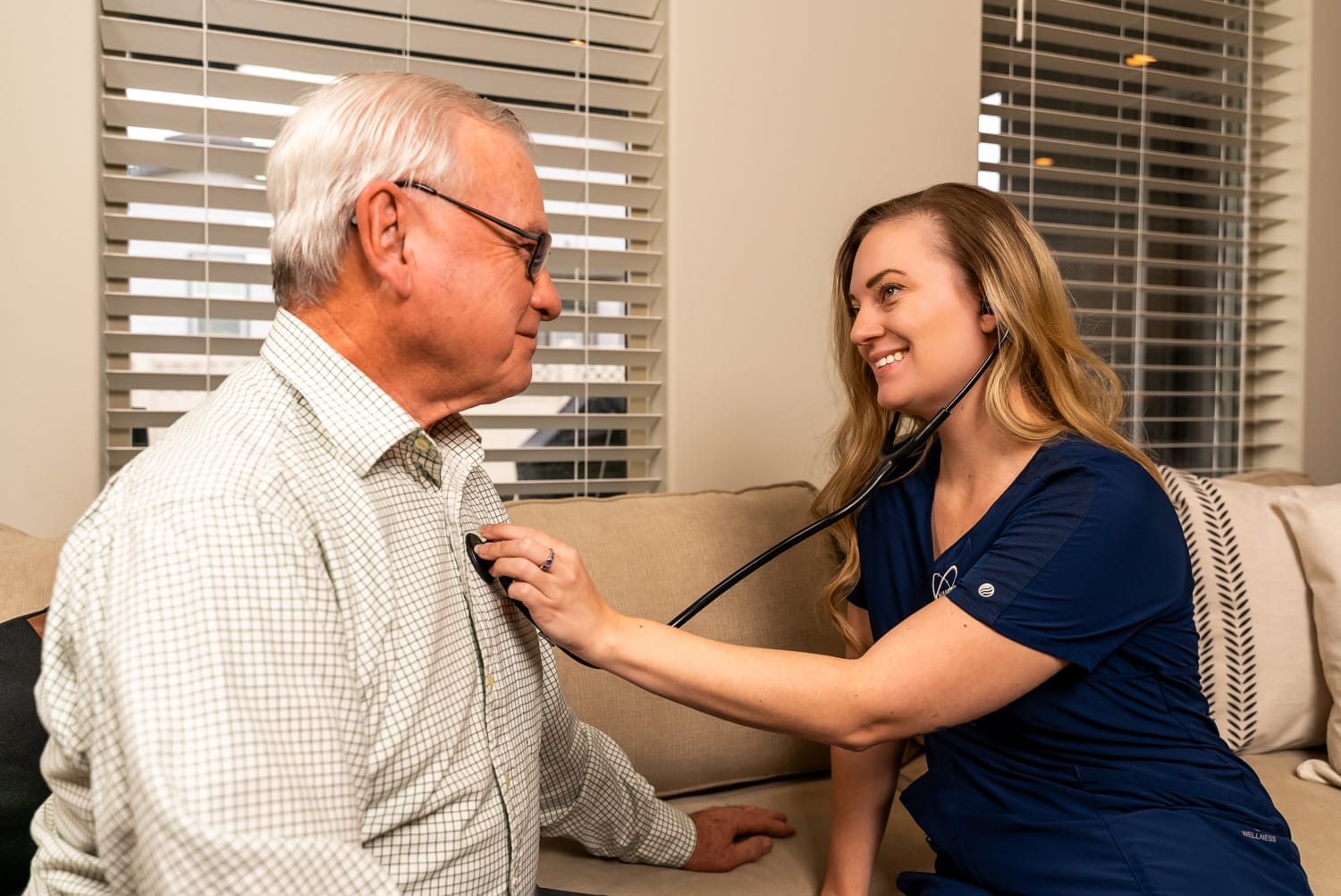 Hanford Home Health_Website Shoot_02.2025-00212 nurse listening to an elderly patient's heart