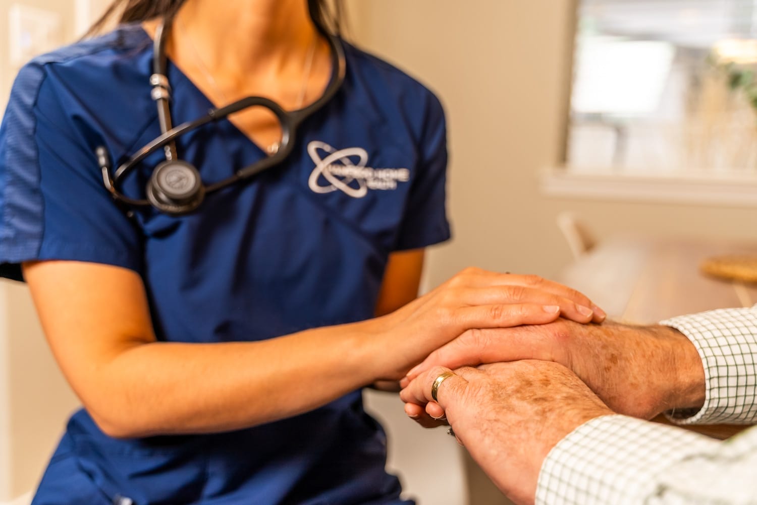 nurse comforting a patient