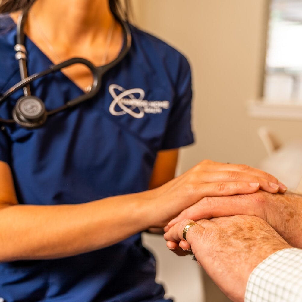 Hanford Home Health_Website Shoot_02.2025-00327 nurse comforting a patient